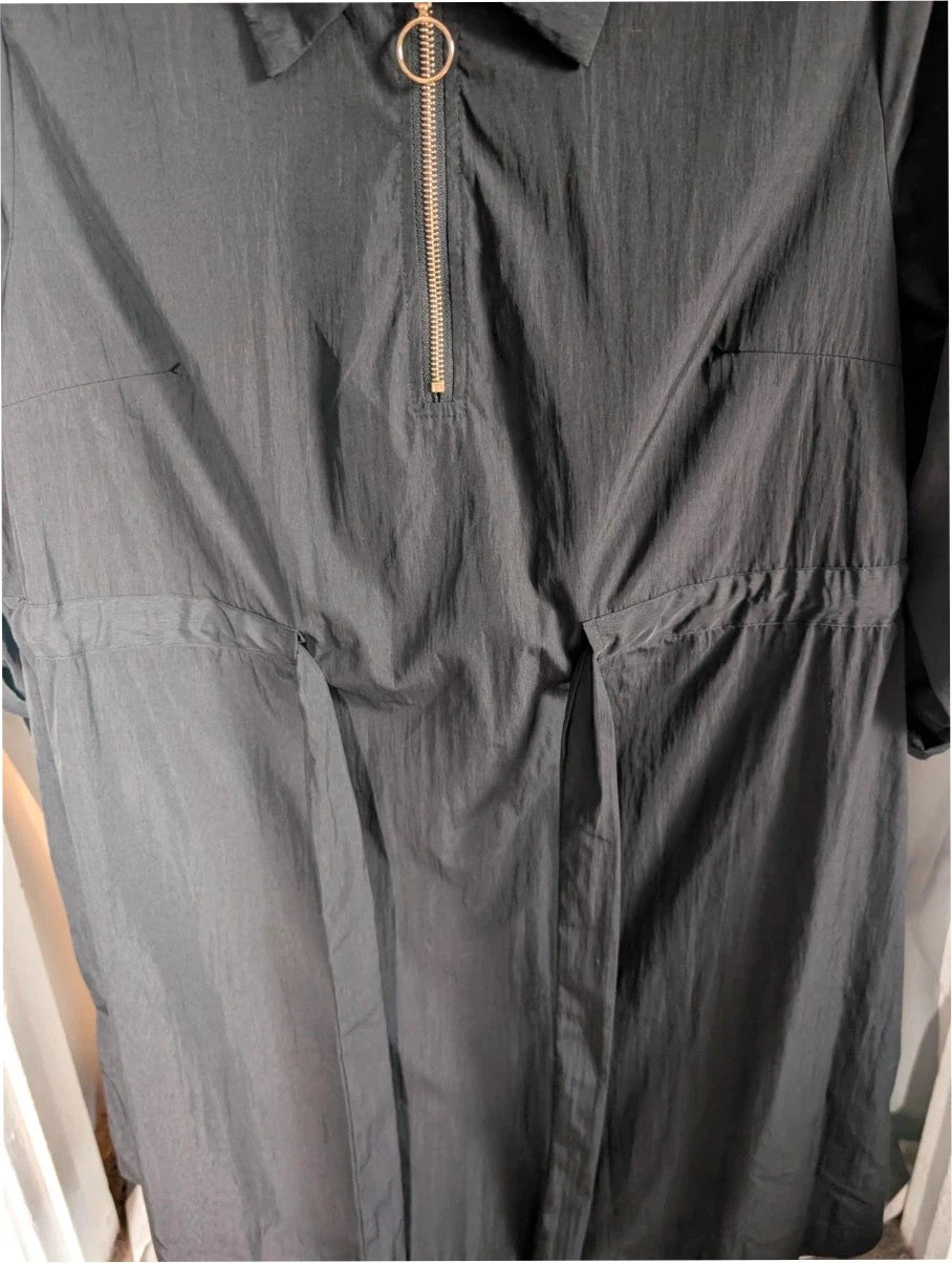 Shein Curve black utility shirt dress with O-ring zip, drawstring waist, and roll-tab sleeves.