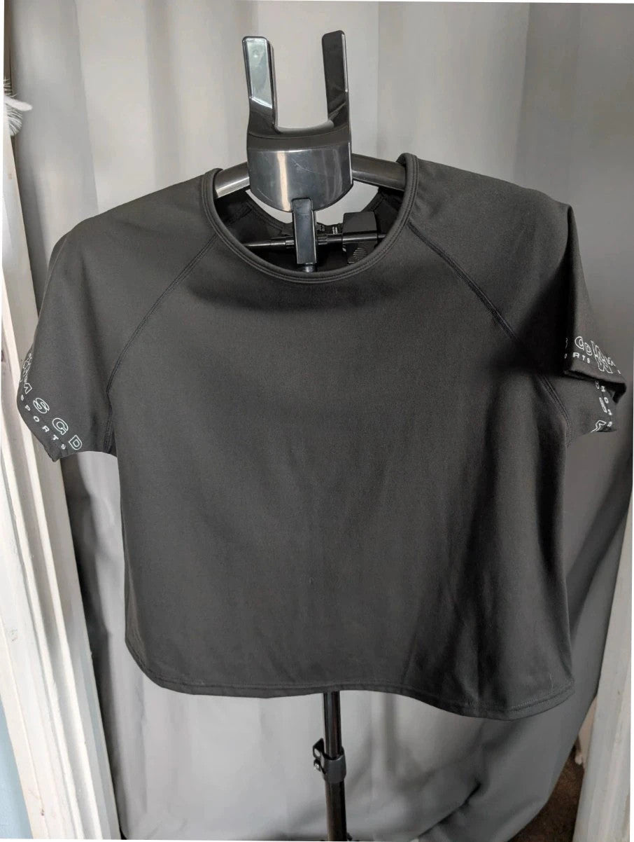 Missguided Plus black cropped gym top with white graphic logo and crew neckline.