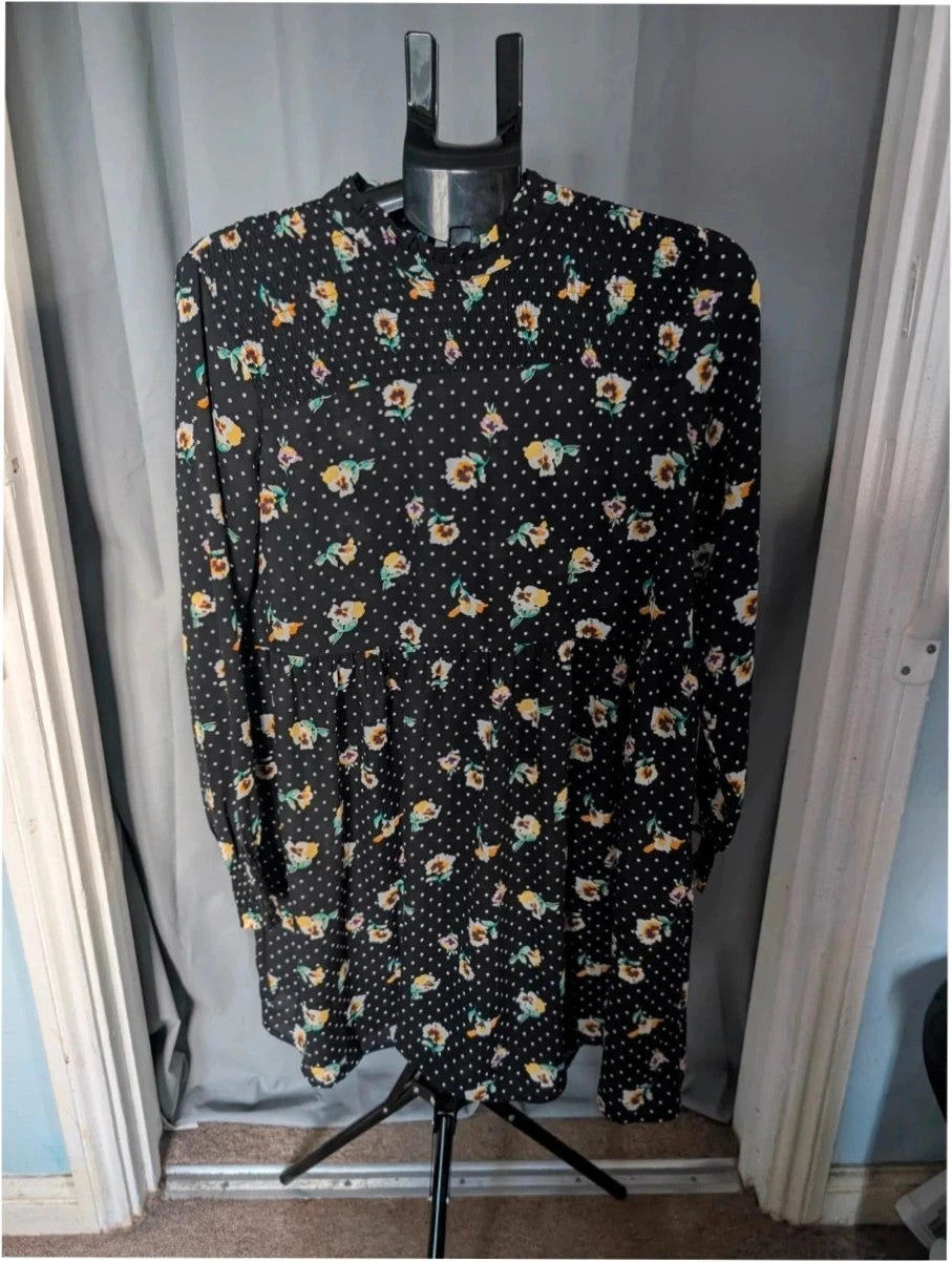 JDY black smock mini dress with floral and polka dot print, long sleeves, and keyhole back.