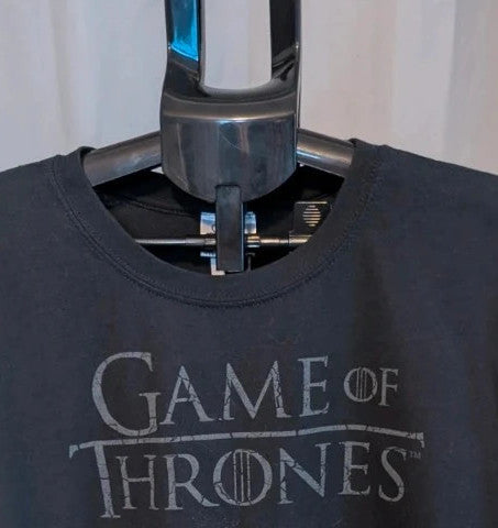 Game of Thrones black graphic tee featuring distressed House Stark direwolf sigil and logo.