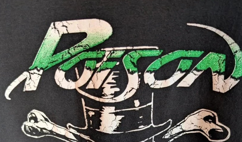 Poison black graphic tee featuring iconic skull and crossbones logo with green and white print.
