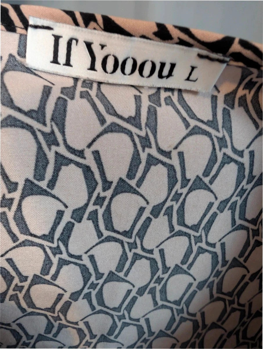 If Yoou beige tunic dress with black geometric print and split Mandarin collar.