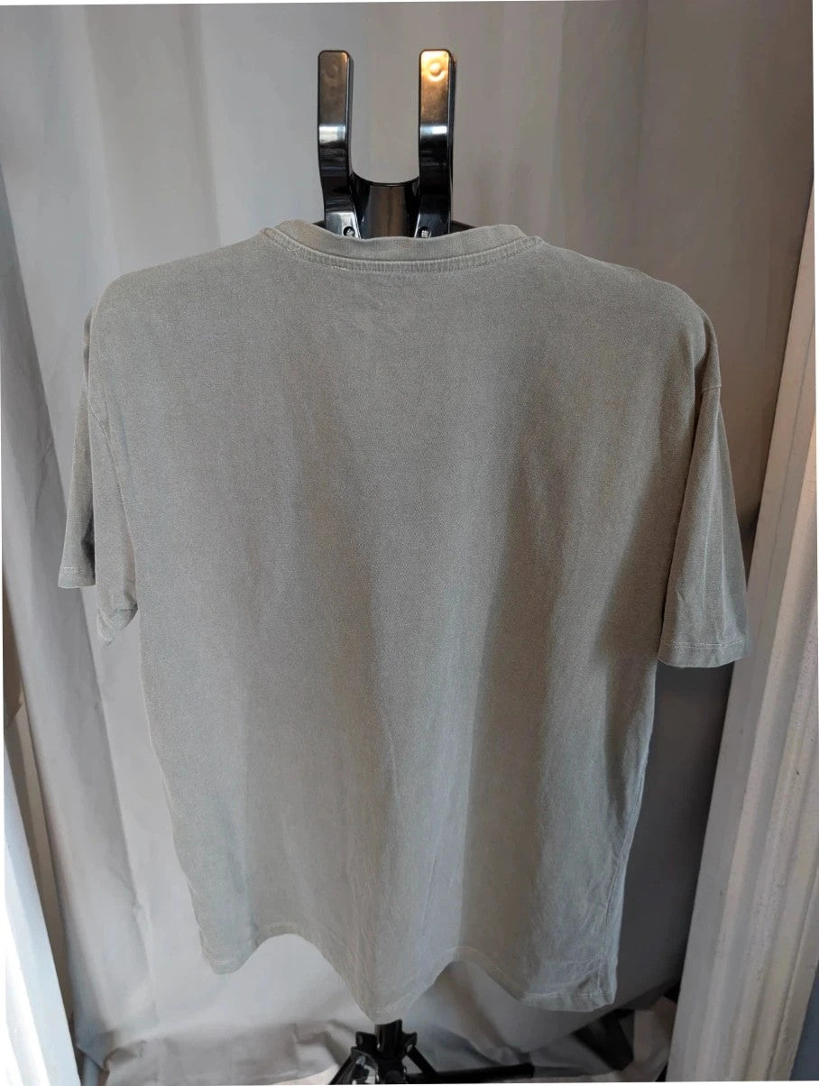 Miles Davis grey graphic t-shirt with "So What 1959" typography and trumpet artwork.