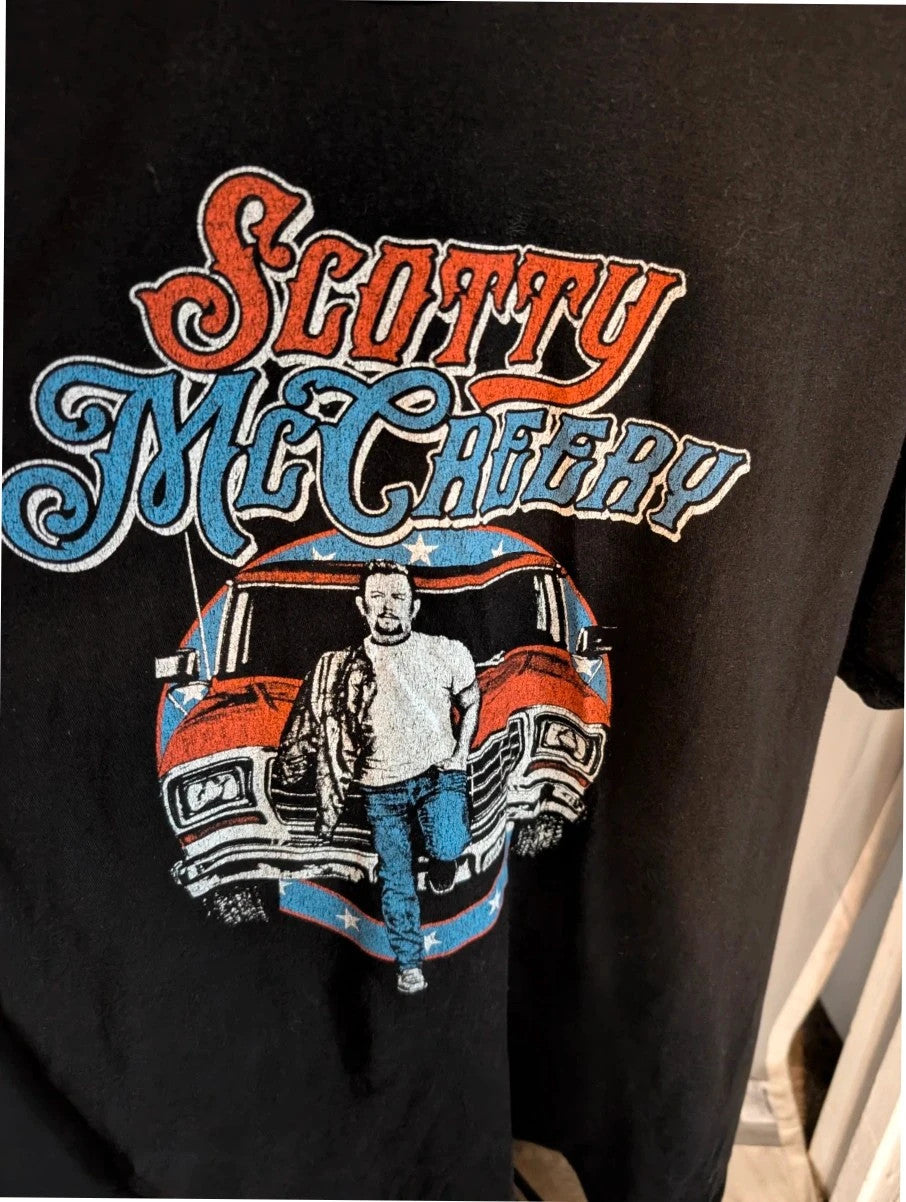 Scotty McCreery black graphic tee with retro truck artwork and tour dates on back.