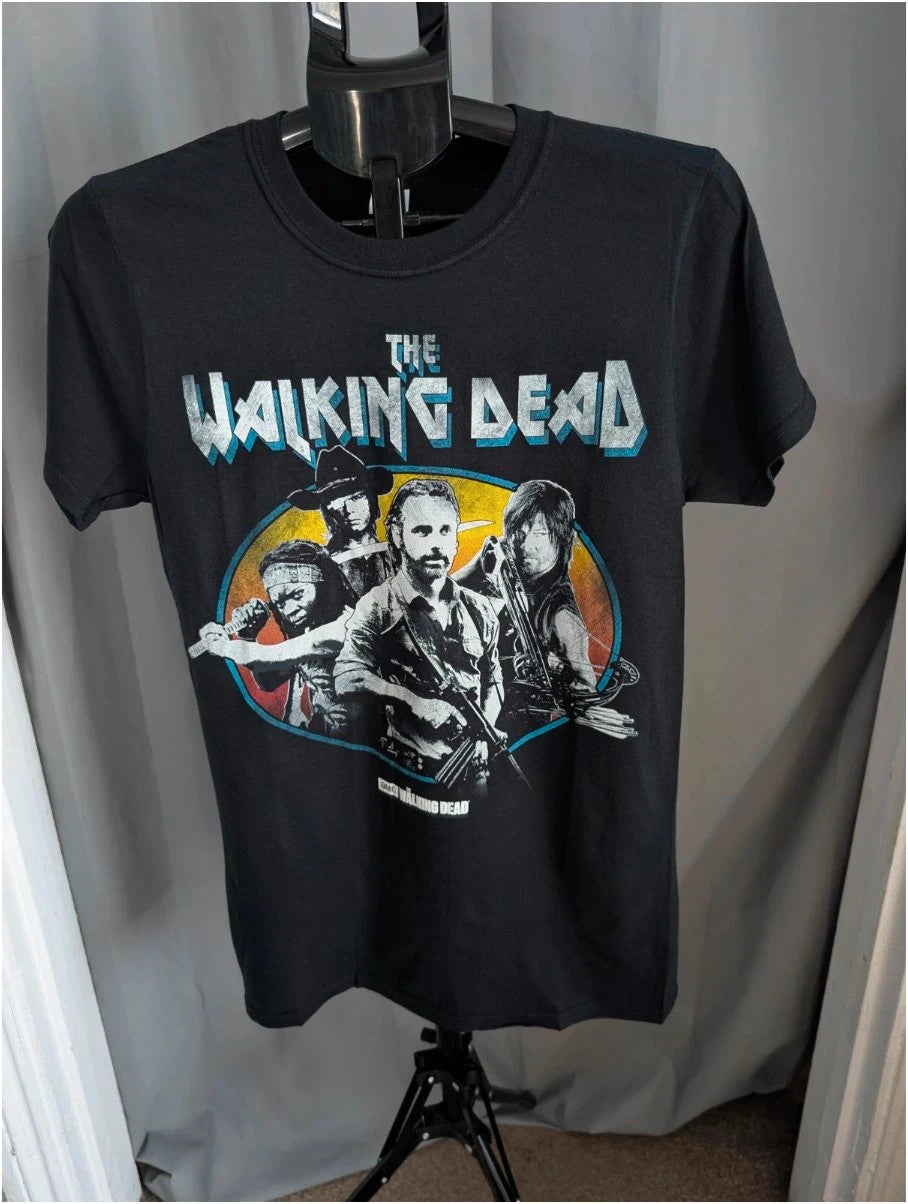 The Walking Dead black graphic tee featuring Rick, Daryl, Michonne, and Carl.
