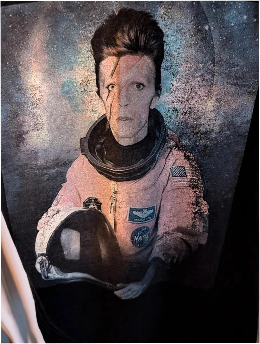 LaBarNa black graphic t-shirt featuring Ziggy Stardust lightning bolt astronaut print.