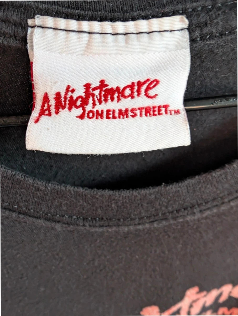 Gildan black graphic tee featuring Freddy Krueger print, soft 100% cotton material.