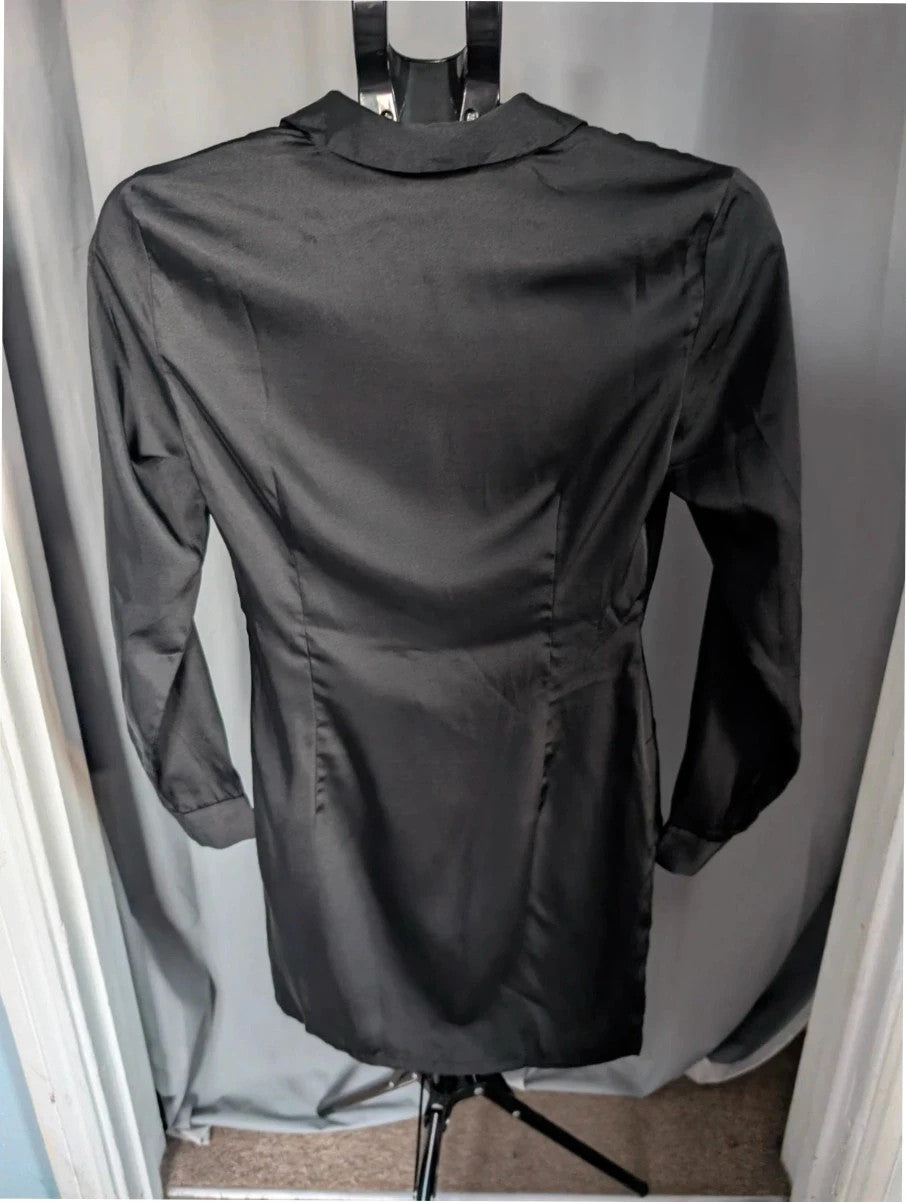Stradivarius black satin pencil dress with twist front, collared V-neck, and long sleeves.