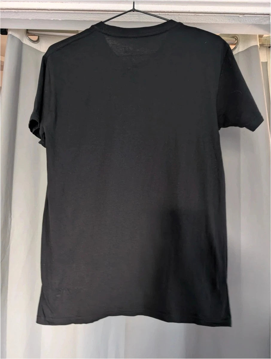 Blink 182 black graphic tee with blue skeleton middle finger design and crew neck.