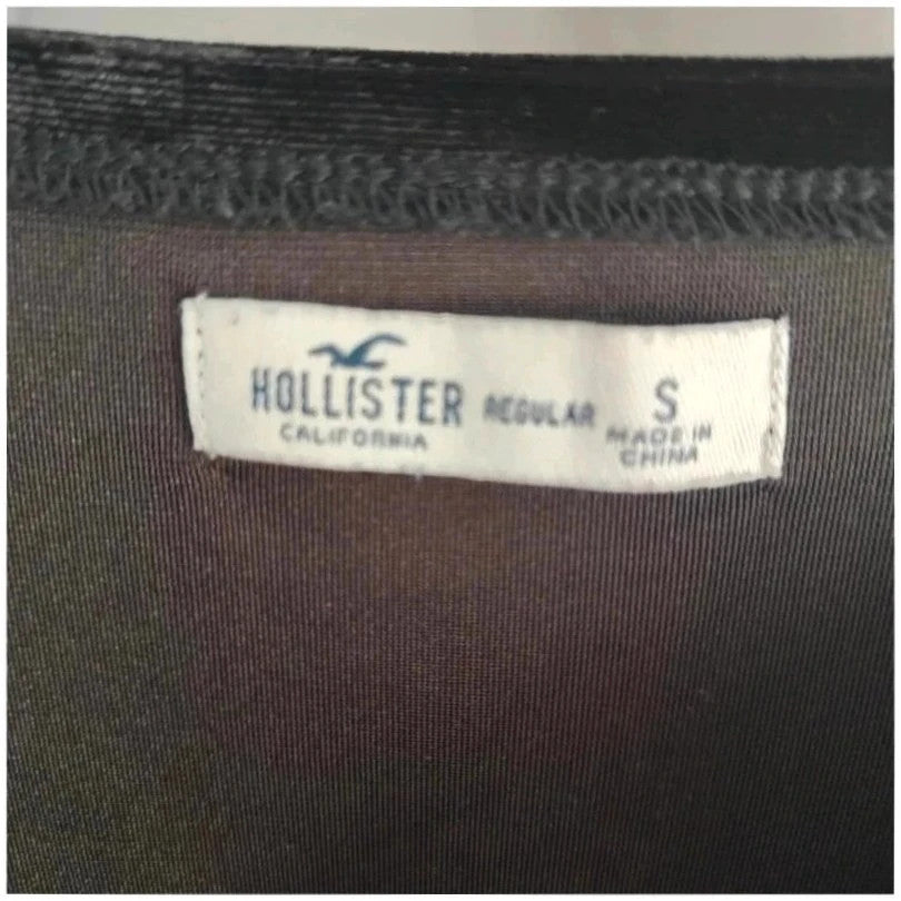 Hollister black velvet slip dress with adjustable straps and soft plush texture.