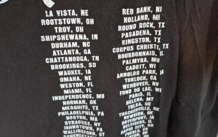 Scotty McCreery black graphic tee featuring retro artwork and US tour dates on back.
