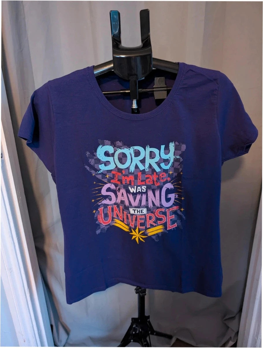 Marvel graphic t-shirt purple featuring "Sorry I'm Late" text and Captain Marvel star motif.
