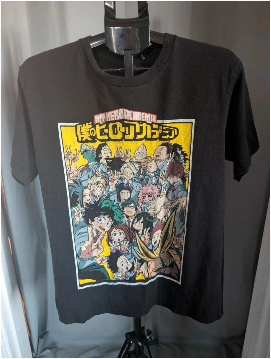 My Hero Academia black graphic tee featuring vibrant comic art panel and dual language title.