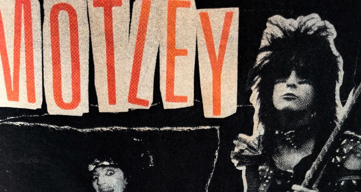 Mötley Crüe black graphic tee featuring retro band collage and red logo lettering.