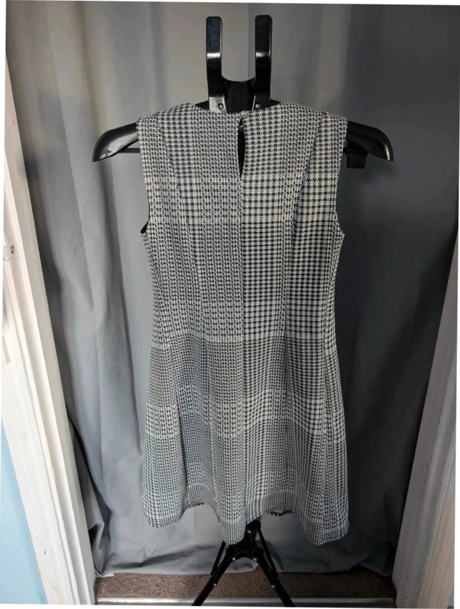 Dorothy Perkins black and white houndstooth shift dress with sleeveless design and back keyhole.
