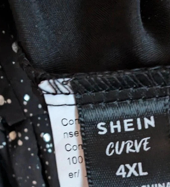 Shein Curve black cold shoulder blouse with silver shimmer, V-neckline and flutter sleeves.
