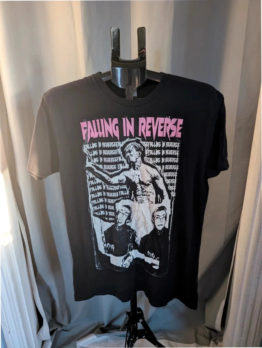Next Level black graphic tee featuring pink Falling In Reverse logo and band portrait.