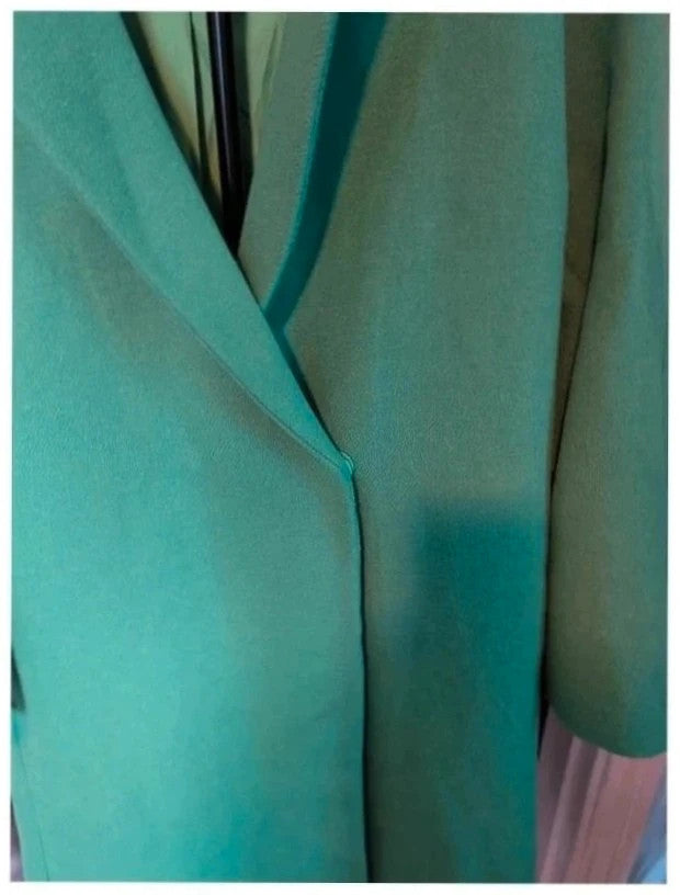 H&M green longline coat with structured shoulders and notch lapel collar.