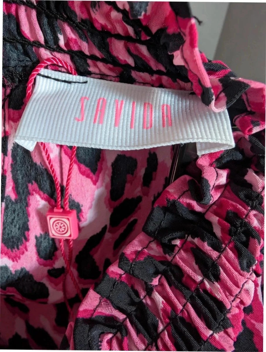 Savida pink and black leopard print mini dress with ruffle details and frill neckline.