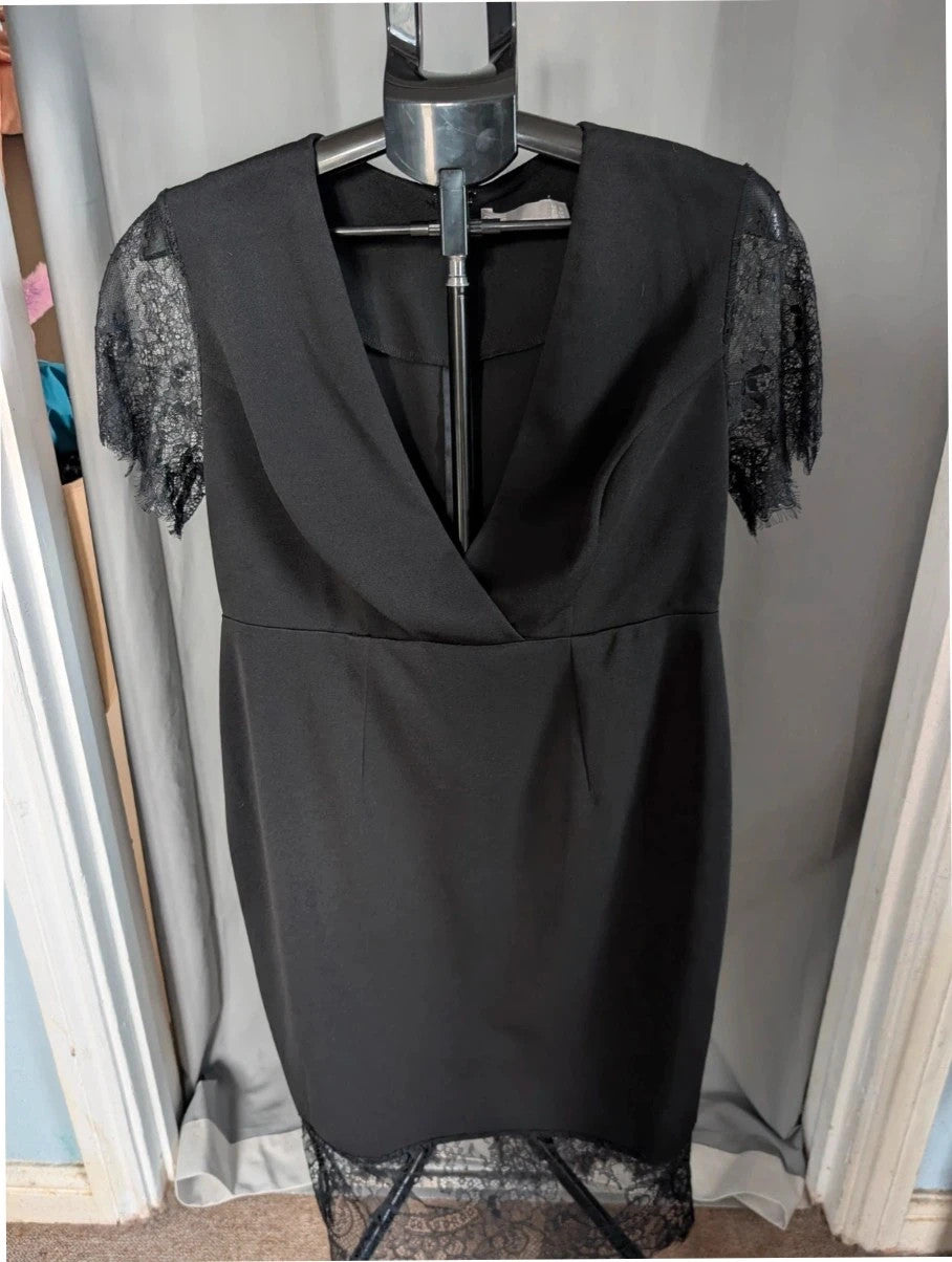 ASOS black bodycon midi dress with plunge neckline and eyelash lace trim details.