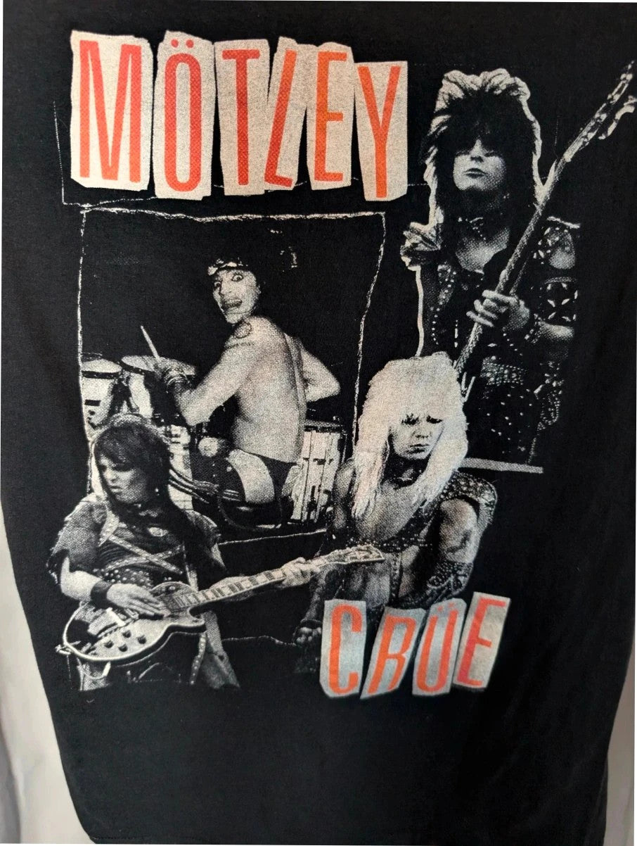 Mötley Crüe black graphic tee featuring retro collage artwork and red block logo.