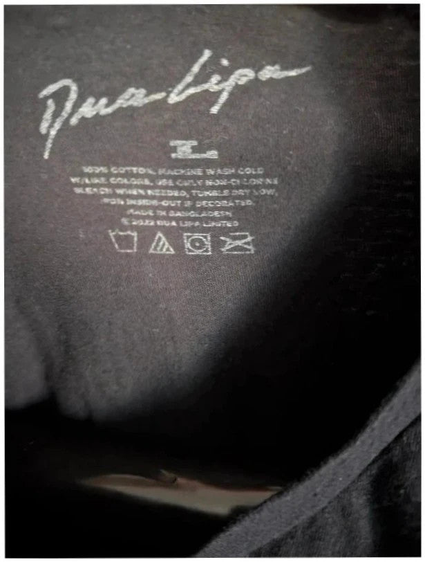 Dua Lipa black graphic tee with front polaroid print and back tour dates list.