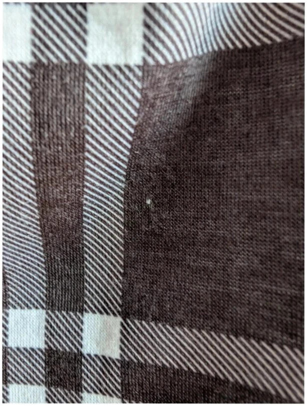 Boohoo black and white mini skirt, monochrome plaid check pattern, soft jersey fabric.