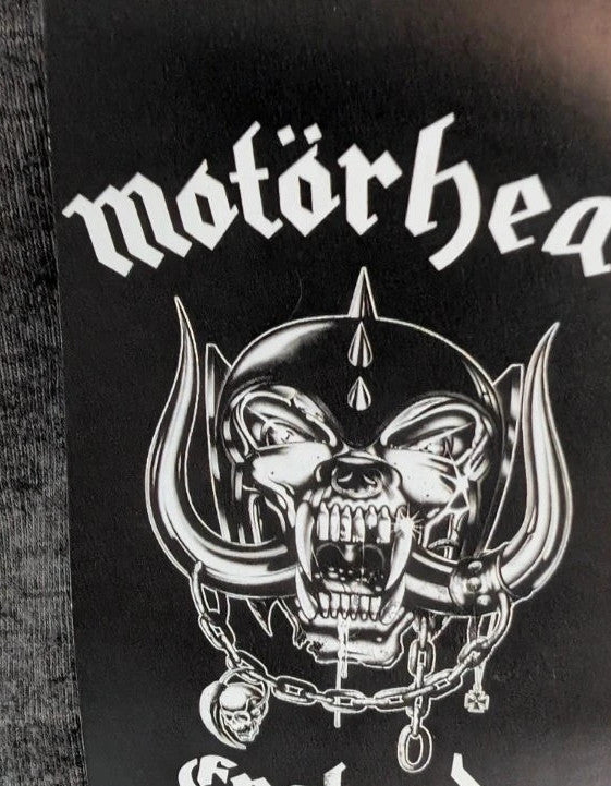 Motörhead grey graphic tee featuring Snaggletooth Warpig emblem and circular print.