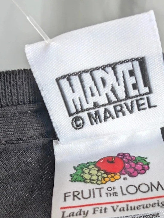 Marvel graphic tee black featuring Thanos and character collage in monochrome print.