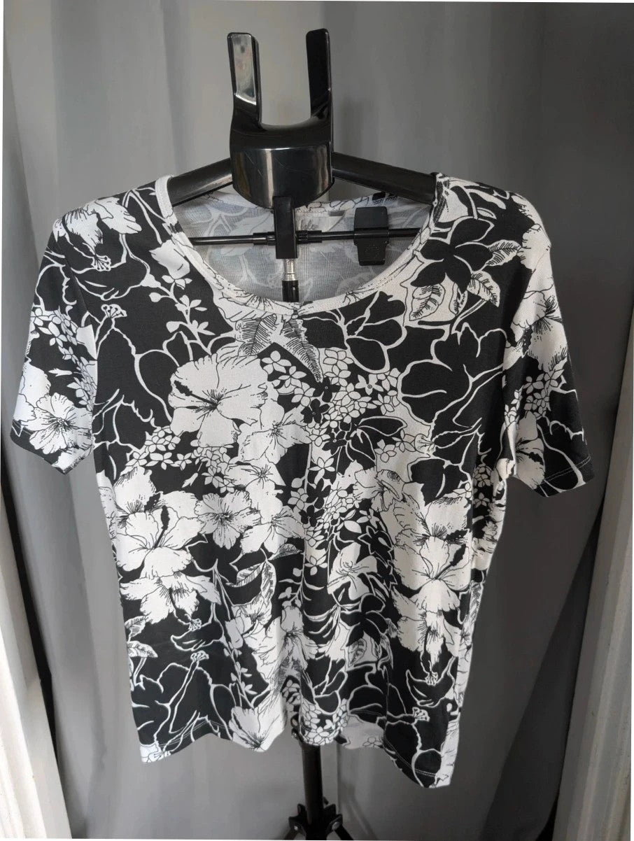 ISLE black white floral graphic t-shirt with rhinestone accents and hibiscus pattern.