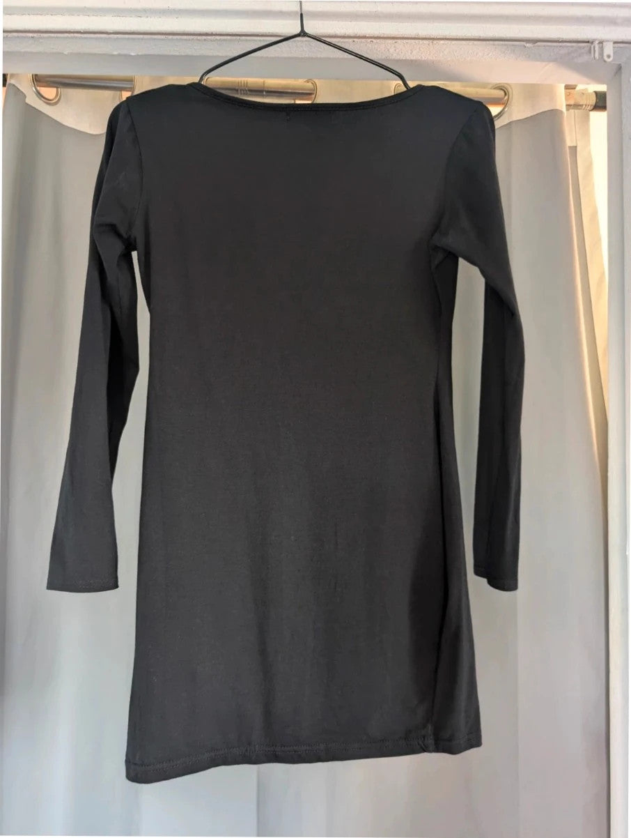 PrettyLittleThing black long sleeve bodycon mini dress with notch neck and fitted sleeves.