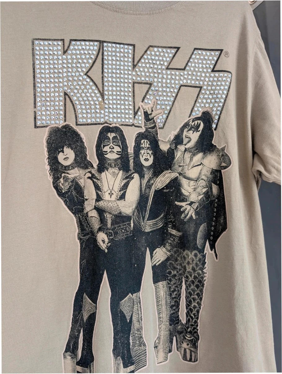 Kiss beige pocket t-shirt with rhinestone logo and band photo graphic.