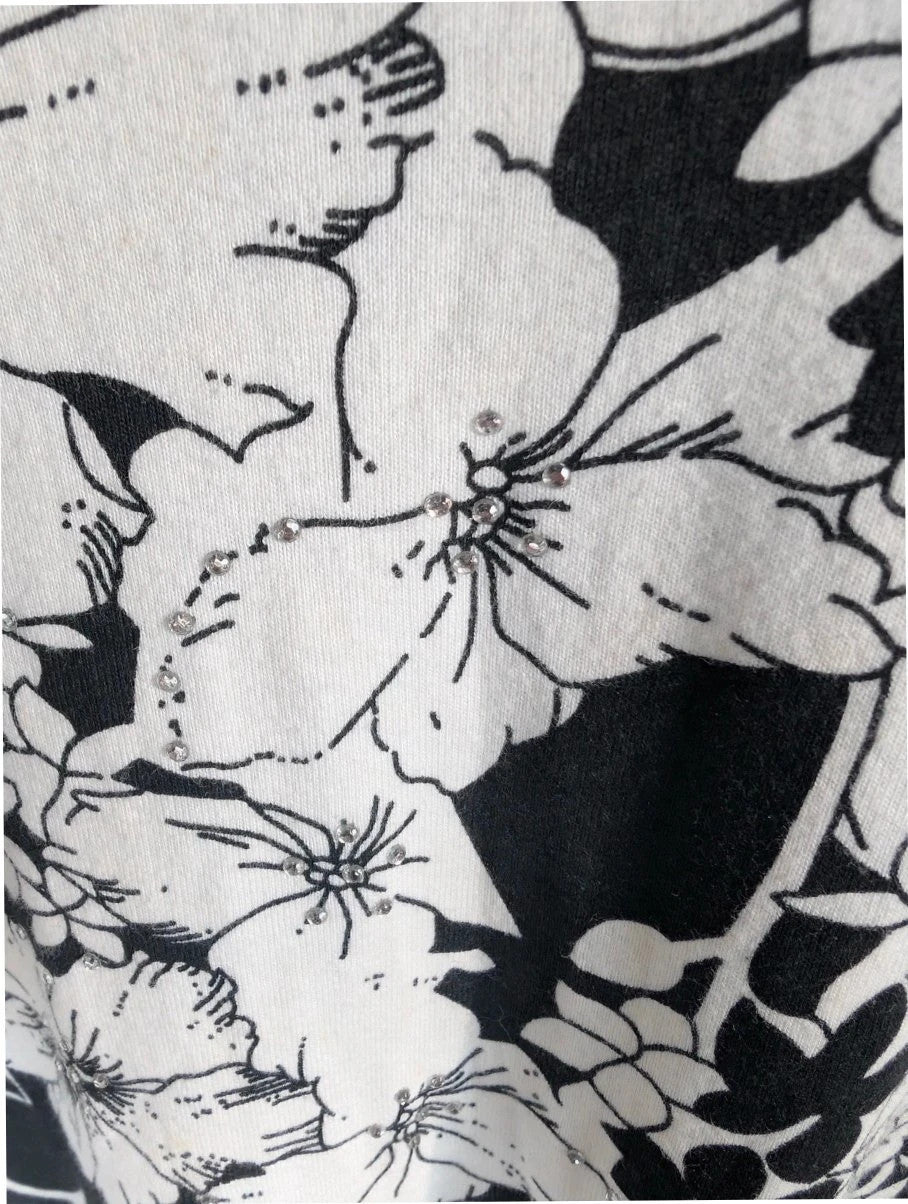 ISLE black white floral graphic t-shirt with rhinestone accents and hibiscus pattern.