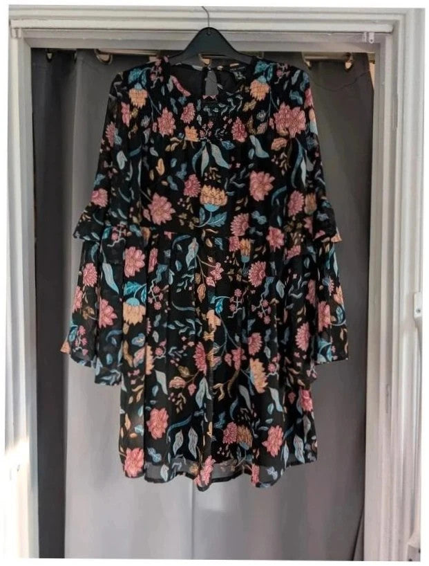 New Look black floral smock dress with bell sleeves and ruffle cuffs, semi-sheer chiffon.
