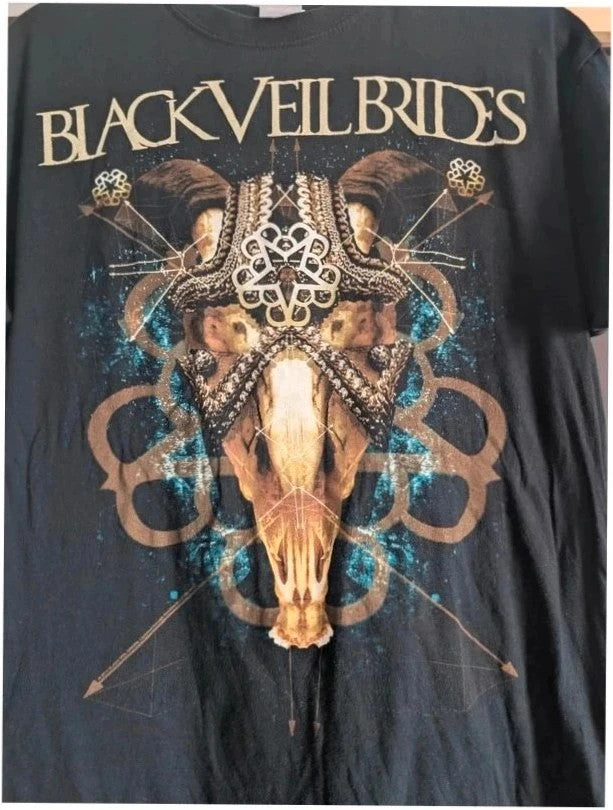 SG black graphic t-shirt featuring ornate goat skull design and distressed cream logo.