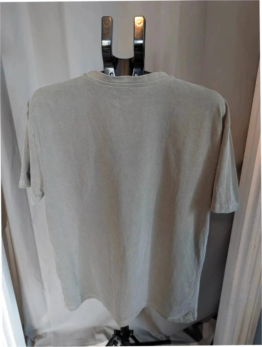 Miles Davis grey graphic tee featuring "So What 1959" typography and trumpet artwork.