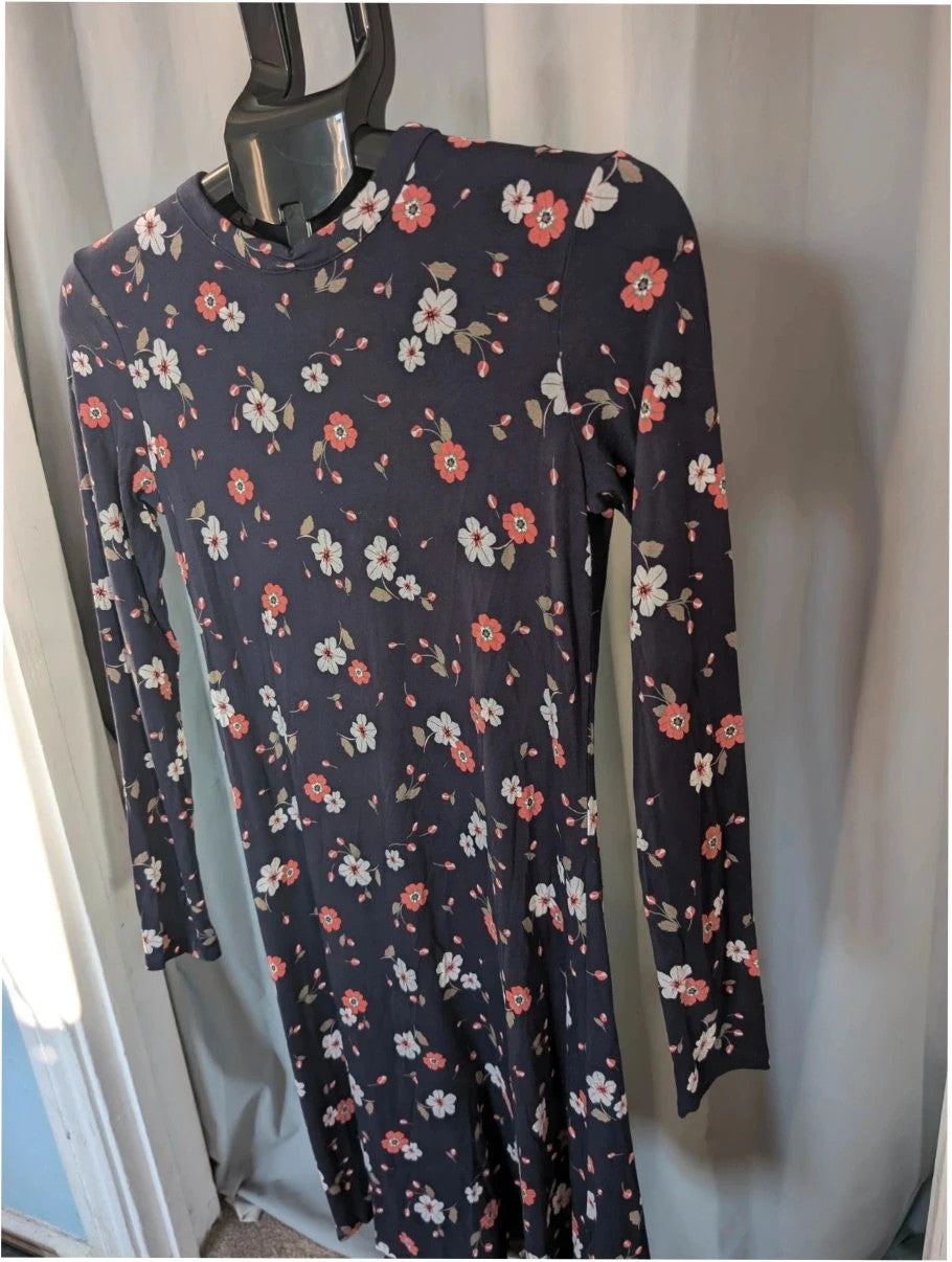 M&S COLLECTION navy blue floral mini dress with high neck and long sleeves.