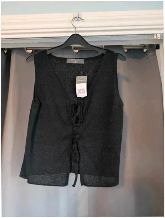 Primark black knit sleeveless vest top with tie front detail and V-neckline.