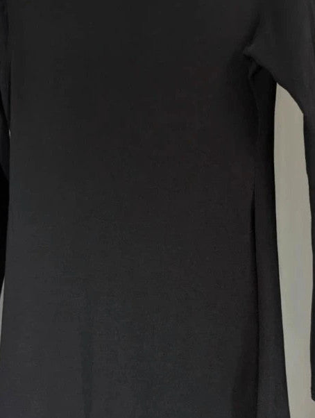 PrettyLittleThing black long sleeve bodycon mini dress with notch neck and fitted sleeves.
