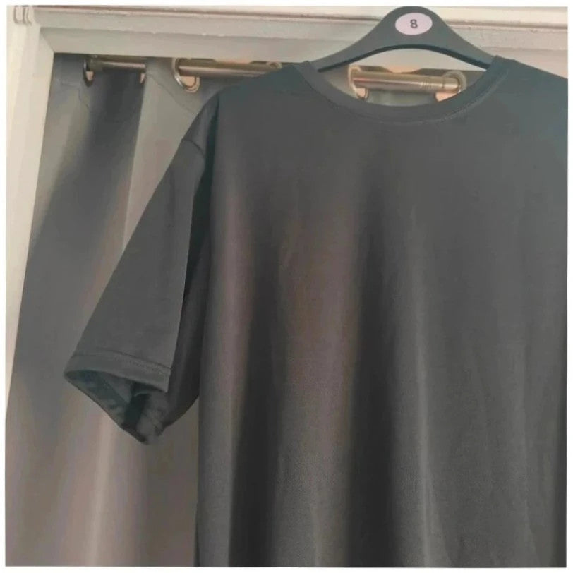 Unbranded black graphic t-shirt with neon pink teddy bear and bold text design.