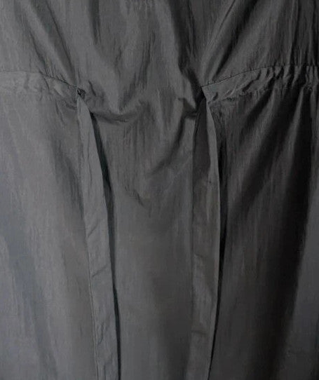 Shein Curve black utility shirt dress with O-ring zip, drawstring waist, and roll-tab sleeves.
