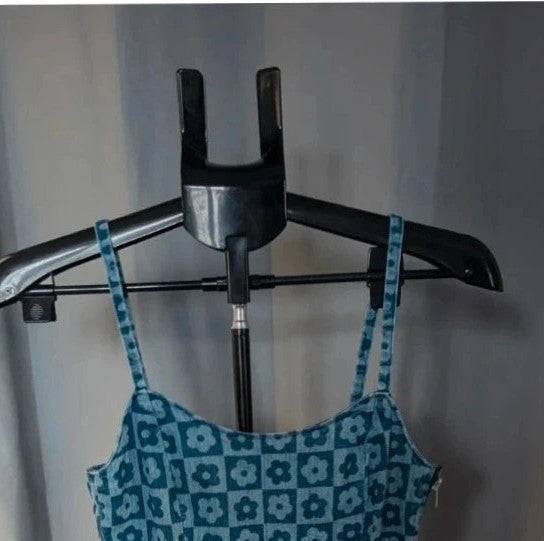 H&M blue floral checkered denim cami mini dress with fitted silhouette and thin straps.
