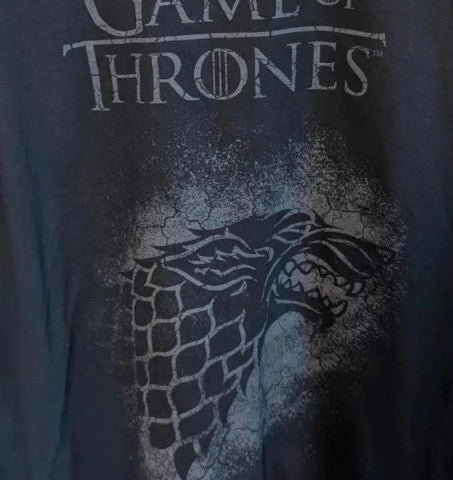 Game of Thrones black graphic tee featuring distressed House Stark direwolf sigil and logo.