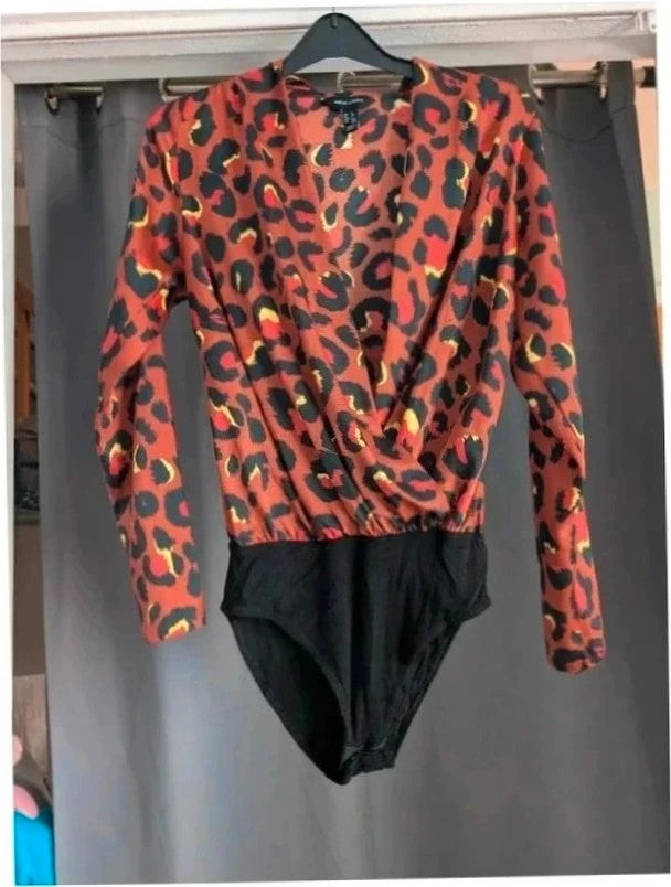 New Look women's bodysuit brown leopard print top, black briefs, plunge V-neck design.