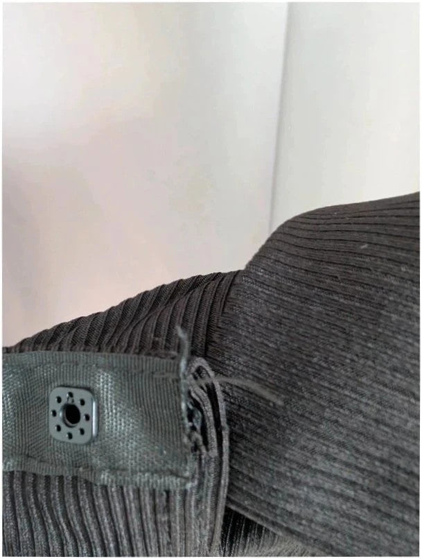 Select black ribbed long sleeve collared bodysuit with deep v-neck and popper fastenings.