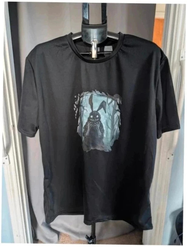 Alternative black graphic tee with creepy bunny illustration and crew neckline.