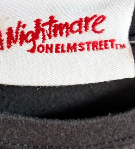 Gildan black graphic tee featuring Freddy Krueger print, soft 100% cotton material.
