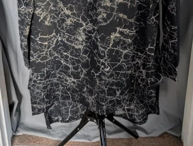 Next black tunic blouse with silver marble print and solid black chest panel.