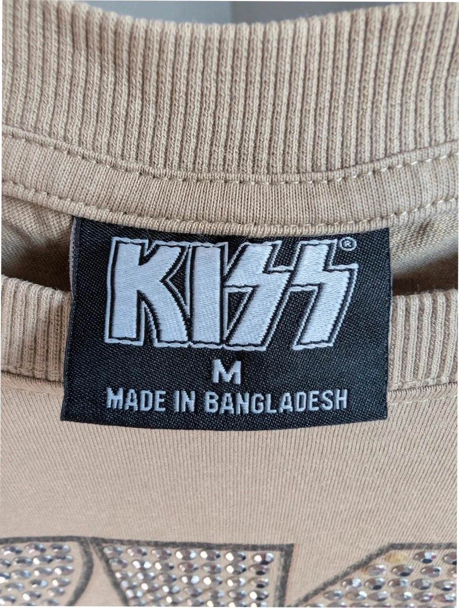 Kiss beige pocket t-shirt with rhinestone logo and band photo graphic.