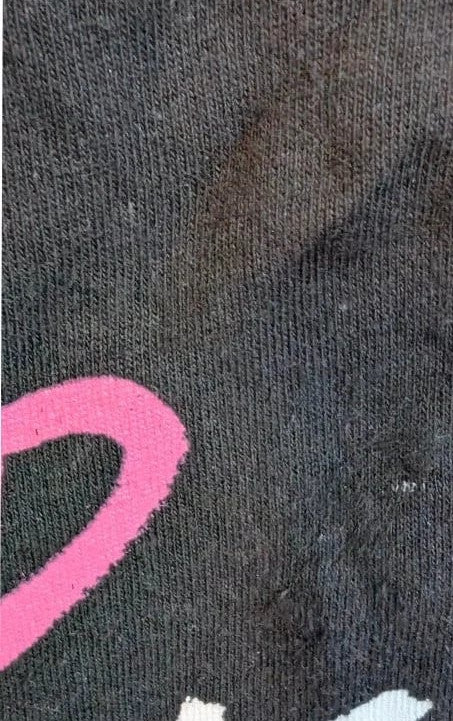 Yungblud black graphic tee with metallic silver portrait and neon pink tour lettering.
